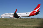 VH-VXI @ YSSY - taxiing to 34r - by Bill Mallinson