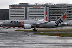 VH-VKD @ YSSY - ONTO A WET 16R - by Bill Mallinson
