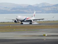 9M-MTA @ NZAA - touchdown - by magnaman