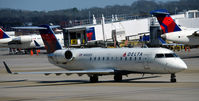 N900EV @ KATL - Taxi for takeoff Atlanta - by Ronald Barker