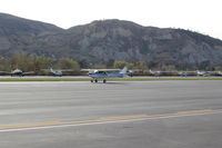 N704UT @ SZP - 1976 Cessna 150M, Continental O-200 100 Hp, landing roll Rwy 22 - by Doug Robertson