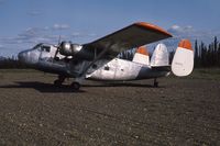 C-GSTX - July 1975:  terr-air CG-STX on the airstrip at Ross River, Yukon, Canada - by Colin Edey