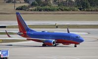 N7713A @ KMCO - Boeing 737-700 - by Mark Pasqualino