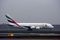 A6-EUZ @ EKCH - A6-EUZ taxing for takeoff rw 04R - by Erik Oxtorp