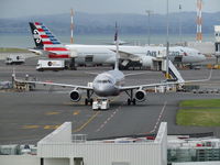 VH-VFY @ NZAA - leaving AKL - by magnaman