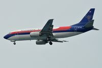 PK-CKE @ WIII - Sriwijaya B733 landing - by FerryPNL