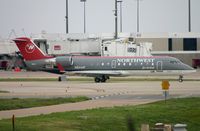 N8444F @ KMEM - Northwet CL200 taxying for departure. - by FerryPNL