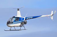 N7073Y @ KBOI - Landing at south helipad. - by Gerald Howard