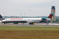 N919FJ @ KCLT - America West Express CL900 lined-up. - by FerryPNL