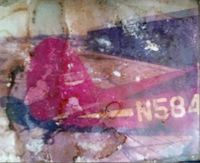 N584 @ KPDK - I am sorry about the quality of these I have some more that are undamaged I will upload when I get them scanned in.My photos got trapped in a glove box that wouldn't open and when I finally broke the door off I found them inside and damaged. - by William Talley