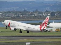 VH-YIT @ NZAA - lift off - by magnaman