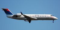 N819CA @ KJFK - Delta CL200 in former uniform - by FerryPNL