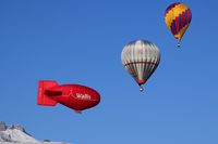 HB-QVS - Blue sky, snowy mountains and colorful balloons - a successfull 40th Festival International de Ballons in Château d'Oex - by Grimmi