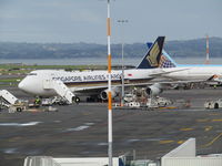 9V-SFK @ NZAA - on stand at AKL - by magnaman