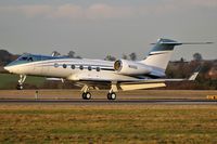 N125GG @ EGGW - N125GG landing into the setting sun at London Luton - by dave226688