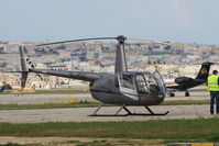 YL-HSG @ LMML - Robinson R44 RavenII YL-HSG - by Raymond Zammit