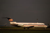 YU-AHV @ EHAM - JAT Douglas DC-9-32 landing at Schiphol airport, the Netherlands, 1984 - by Van Propeller