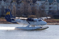 C-GOKN @ CYVR - Departing from the float base at YVR - by Guy Pambrun