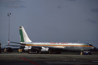9J-ADY @ EHAM - National Air Charters Boeing 707-349C freighter on the platform of Schiphol-Oost, the Netherlands, 1988 - by Van Propeller