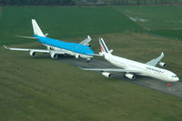 PH-BFF @ EHTW - Waiting to be scrapped by Aircraft End-of-Life Solutions (AELS) at Twente: Airbus A340-313 F-GLZR and Boeing 747-406 PH-BFF - by Van Propeller