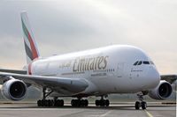 A6-EUG @ LOWW - Turning into stand D27 - by Hotshot