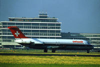 HB-IDP @ EHAM - Swissair Douglas DC-9-32 landing at Schiphol airport, the Netherlands, 1984 - by Van Propeller