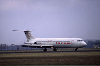 YR-BCI @ EHAM - Tarom BAC One-Eleven 525FT landing at Schiphol airport, the Netherlands, 1988 - by Van Propeller