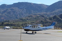 N4617W @ SZP - 1980 Cessna P210N CENTURION, Continental TSIO-520 325 Hp, pressurized and turbocharged, taxi off the active Rwy 04 - by Doug Robertson