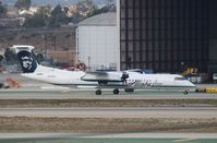 N409QX @ KLAX - DHC-8-402