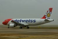 HB-JJL @ EGSH - Formerly D-ABNV with Air Berlin, leaving foggy Norwich with Edelweiss colour scheme. - by keithnewsome