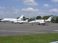 G-LUBB @ EGLK - Parked at Blackbushe airfield EGLK with N843TE and M-SNAP in the background - by Marc Mansbridge