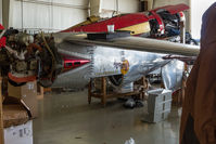 N79JK @ KENW - Bushby Midget Mustang under restoration, Kenosha Regional Airport, Wisconsin - by Graham Dash