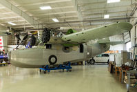 N9074U @ KENW - Grumman G-21A Goose N9074U under restoration at Kenosha Regional Airport - by Graham Dash