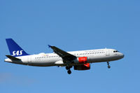 OY-KAS @ EKCH - OY-KAS landing rw 04L - by Erik Oxtorp