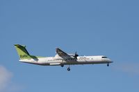 YL-BAX @ EKCH - YL-BAX landing rw 04L - by Erik Oxtorp