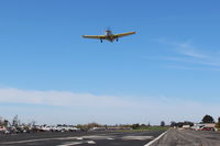 N24RM @ SZP - 1959 Beech K35 BONANZA, Continental IO-470-C 250 Hp, takeoff climb Rwy 04, a strong Santana wind today - by Doug Robertson