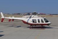 N221JB @ KBOI - Parked on northeast side of field. - by Gerald Howard