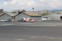 N714HH @ SZP - 1977 Cessna 150M, Continental O-200 100 Hp, taxi to Rwy 22 - by Doug Robertson