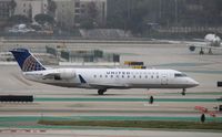 N976SW @ KLAX - CL-600-2B19 - by Mark Pasqualino