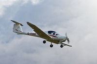 C-FENF @ CYXX - Landing - by Guy Pambrun