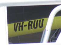 VH-RUU @ YRED - hiding amongst hangar clutter - not hopping about - by magnaman