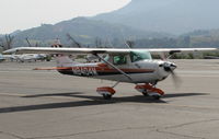 N8404M @ SZP - 1969 Cessna A150K AEROBAT, Lycoming O-320-E2D 150 Hp upgrade by AVCON STC, taxi - by Doug Robertson