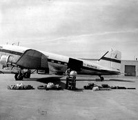 N49466 @ MSO - DC3 being loaded with cable for Moose Creek bridge project - by Forest Service