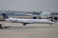 N16976 @ KORD - EMB-145LR - by Mark Pasqualino