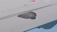 N955LR @ KDFW - Flap losing paint - by John Howard