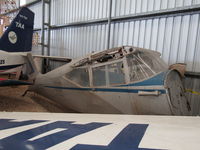 VH-KCL - Lurking at back of hangar at Caloundra musuem - by magnaman