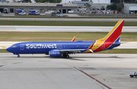N8514F @ KFLL - Boeing 737-8H4 - by Mark Pasqualino