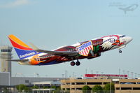 N918WN @ KDAL - N918WN Rotating in style out of Runway 13R at Dallas Love Field. As the thin layers of cirrus roll in I loose some sunlight. Still worth the wait. - by Nelson Acosta Spotterimages