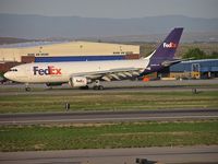 N663FE @ KBOI - Take off run on RWY 10L. - by Gerald Howard