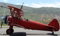 N68405 @ SZP - 1943 Boeing Stearman A75N1 (PT-17), P&W R985 Wasp Jr. 450 Hp upgrade, preflight, carries/will display lady wing rider today - by Doug Robertson